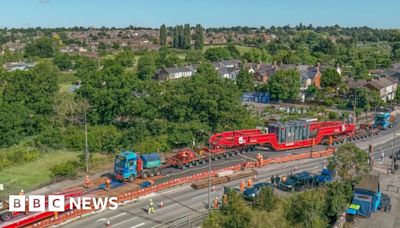 Ipswich aerial images show abnormal load passing through town