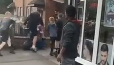 Moment 'gang of feral children' attack man and stamp on his head