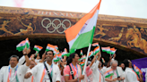 PIX: Flag bearers Sindhu, Kamal lead India in floating parade