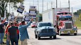 UAW, automakers remain far apart four days into strike