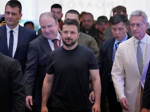 Zelensky makes surprise stop at Singapore defense gathering as Ukraine pushes for its peace plan amid Russian advance