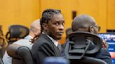 Rapper Young Thug's trial on racketeering conspiracy and gang charges begins in Atlanta