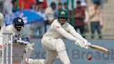 Cricket-Australia score modest 263 underpinned by Khawaja, Handscomb