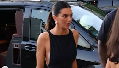 Kendall Jenner flashes her sideboob in a chic backless dress