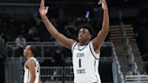 Great Osobor of the Utah State Aggies reacts after a shot against the TCU Horned...first round of the NCAA Men's Basketball Tournament at Gainbridge...