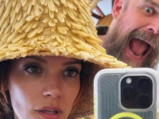 Lily Allen tries on hats with husband David Harbour in Italy