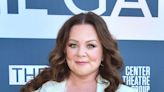 Melissa McCarthy shows off slimmer figure in ruffled princess gown