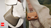 The way you carry your handbag reveals THIS about your personality - Times of India