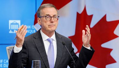 Bank of Canada cuts rates, sees weaker economy in 2024