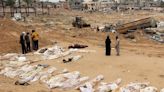 Almost 400 bodies have been found in mass grave in Gaza hospital, says Palestinian Civil Defense