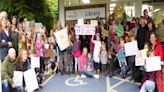 Campaigners step up protest against library closures after children’s demonstration
