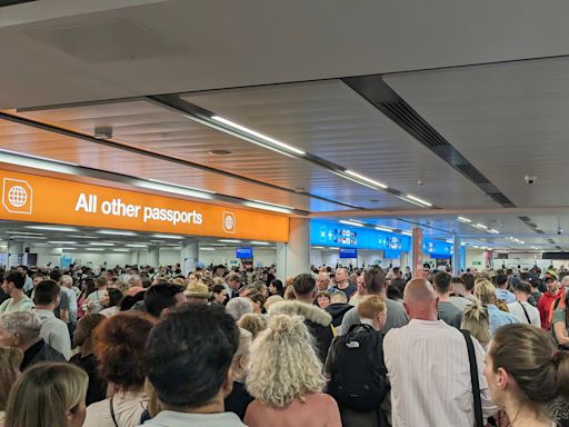 Passengers were stuck for hours in sweaty, stifling corridors at Britain's busiest airports as passport systems crashed