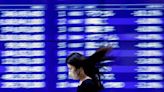 Asian shares extend gains ahead of tech earnings, yen fragile