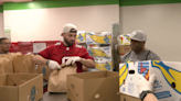 Baker Mayfield helps volunteer with Fifth Third Bank at Feeding Tampa Bay