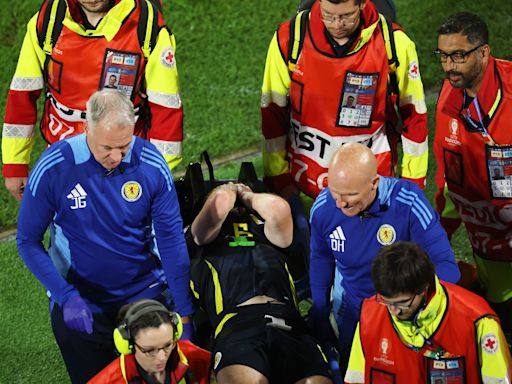 Tournament over? Kieran Tierney stretchered off for Scotland