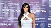 Kim Kardashian Is a Vixen in a White Leather Gown Full of hot Cutouts