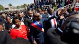 Widow of slain Haitian president files lawsuit against suspects seeking trial and damages