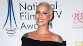 Amber Rose insists she and Chris Rock are just 'good friends' following dating rumour