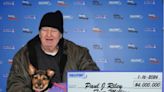 Massachusetts man brings his dog to lotto office as he claims $4 million prize