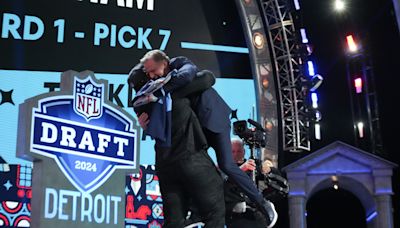 Alabama's JC Latham picks up Roger Goodell in bear hug after Titans take him at No. 7 in 2024 NFL Draft