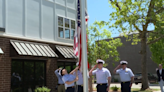 Apartment complex hosts grand opening in honor of late Coast Guardsman