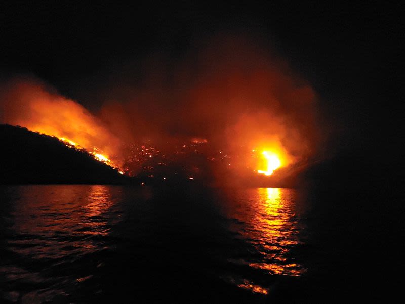 Yacht crew expected to deny arson charges over fire on Greek island