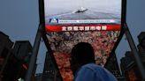 China stages mock missile strikes on Taiwan, bombers with live missiles used in drills