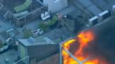 3-alarm fire burns SoHo rooftop as neighbor tries to help firefighters with garden hose