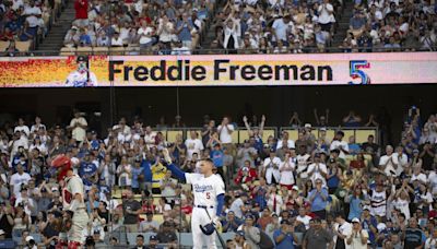 Emotional Freddie Freeman gets hug from Bryce Harper in return to Dodgers as ailing son recovers