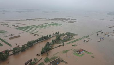 5,000 people rescued from flooding in North Korea in evacuation efforts led by Kim, report says