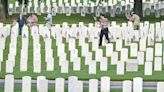 PHOTOS: River Valley volunteers ready National Cemetery for Memorial Day | Northwest Arkansas Democrat-Gazette