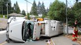 Garbage truck overturns in crash on Nanaimo's Rutherford hill