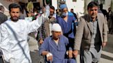 Twin bombings at Pakistan political offices kill at least 28 on eve of national vote