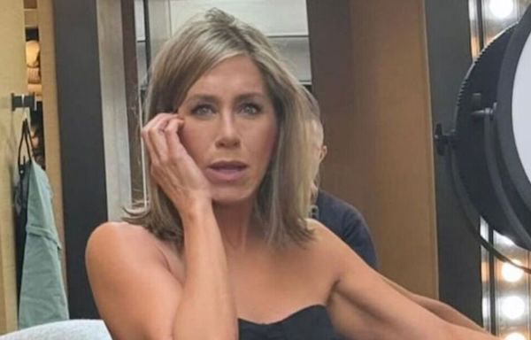 Jennifer Aniston looks younger than ever in plunging dress for very rare selfie