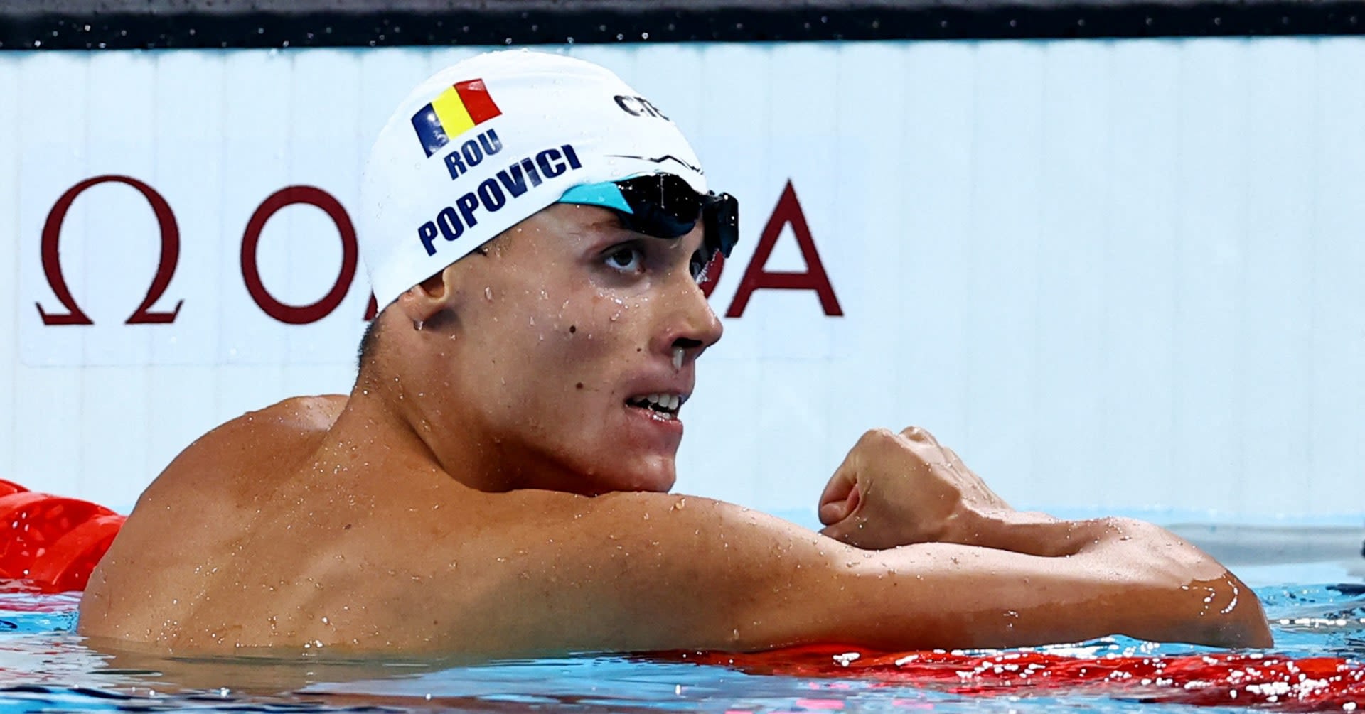 Swimming-Popovici takes men's 200 metres freestyle gold