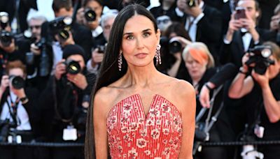 Demi Moore Makes Her Mark on the Cannes Red Carpet in Red-Hot Gown and Waist-Length Hair