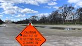 Reflecting Pool almost fully drained for annual cleaning