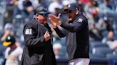 A fan heckled the ump. The Yankees’ Aaron Boone was tossed for it.