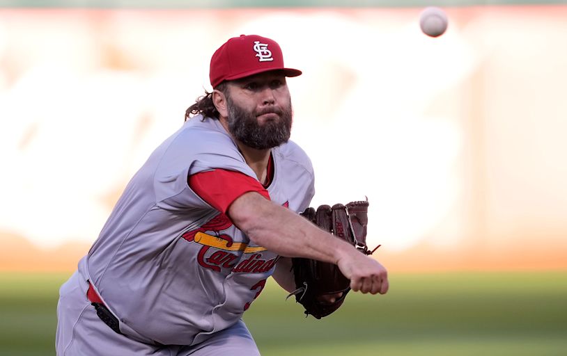 Lynn earns his first win in second stint with Cards, who beat A's before season-low crowd of 3,296