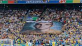 'Peace has a price': Football fans display mosaic of fallen Ukrainian soldiers at Euro 2024 match