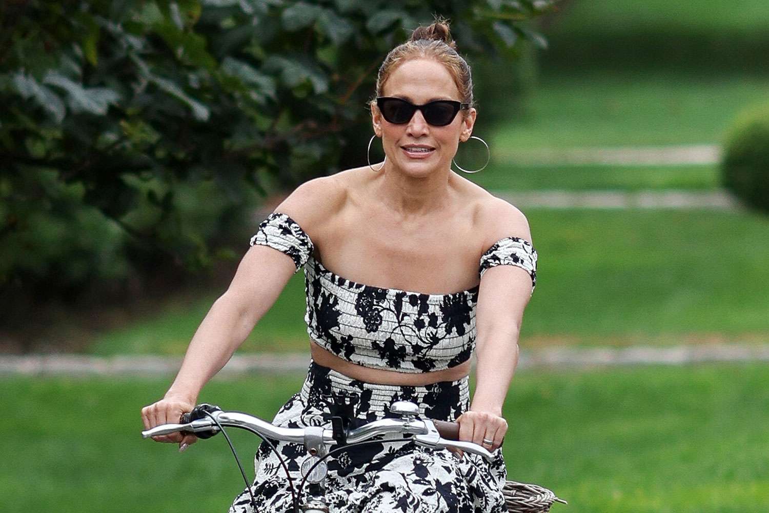 Jennifer Lopez Continues Hamptons Chic Style Streak in Flower Crop Top During Bike Ride