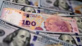 Argentina, in dollar love affair, agonizes over divorcing the peso