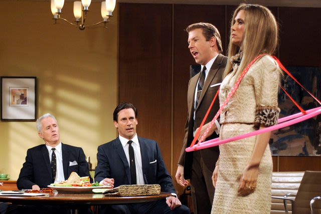 Kristen Wiig and Jon Hamm look back on “SNL ”meeting when cast wore “Mad Men” drag: 'Very strange'