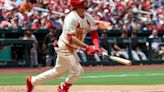 Alec Burleson of the St. Louis Cardinals watches the flight of his two-run home run during the fourth inning against the San Francisco Giants at Busch Stadium on Saturday...