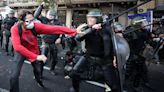 Hundreds of protesters clash with police during debate on Javier Milei’s economic reforms