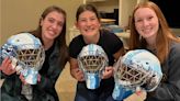 Goalie friends on Team Alberta show off new helmets ahead of Canada Winter Games