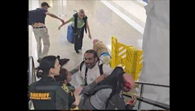 Rapper Jim Jones involved in Florida airport brawl — on an escalator. See the wild clip