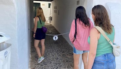Menorca resort shuts out sightseers with chains across alleyways