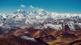 Massive tectonic collision causing Himalayas to grow may also be splitting Tibet apart