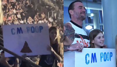 CM Punk Meets Fan With ‘CM Poop’ Sign After WWE RAW